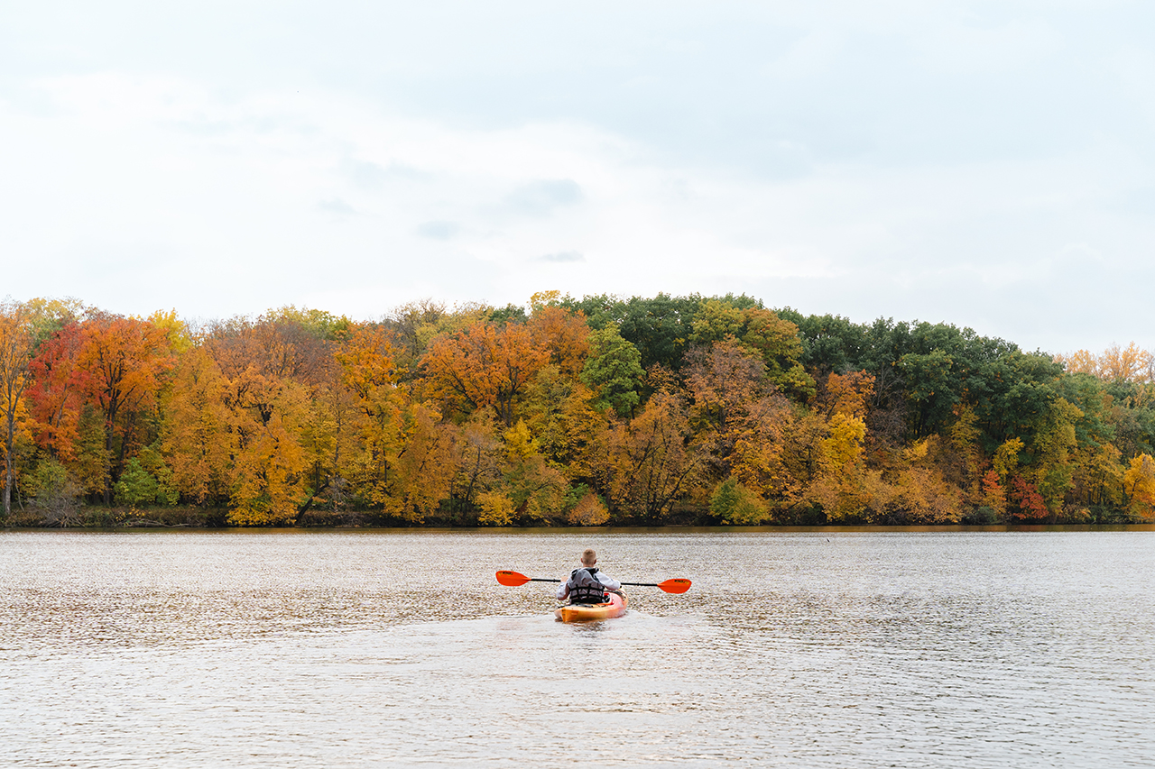 Kayaker on the Cedar River in Waverly, Iowa.